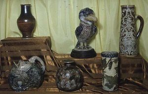Pottery by the Martin brothers, grotesque bird at back typifies the Gothic side of their work